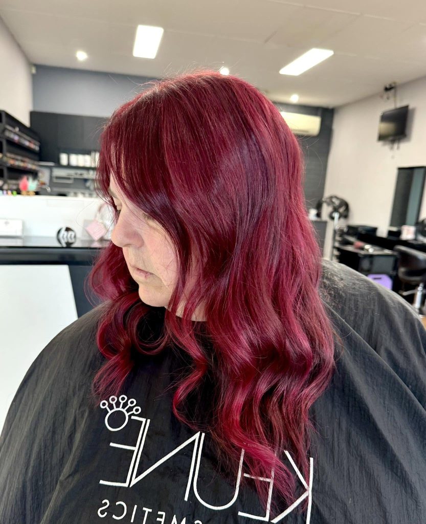 Vibrant red hair colour at Hair Envy Wallacia