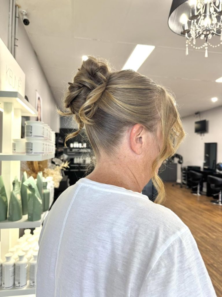 Elegant blonde upstyle at Hair Envy Wallacia